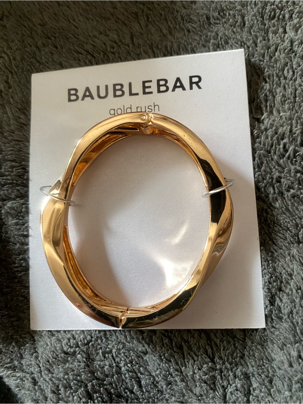 BaubleBar Shiny Gold Twisted Hoop Bracelet